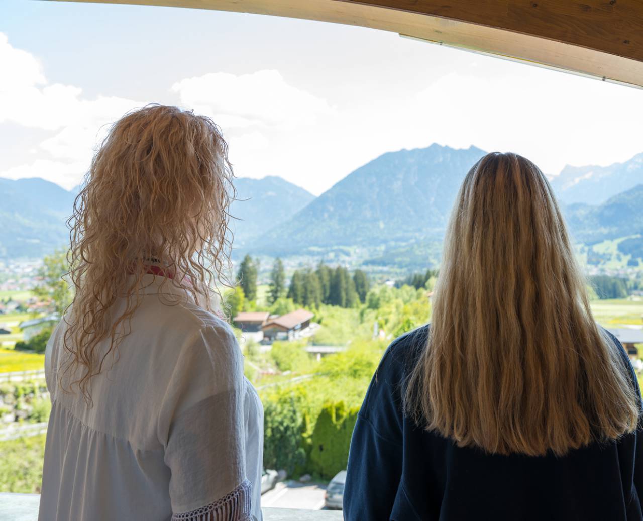 Two ladies enjoy the beautiful view from the PanoramaSuite