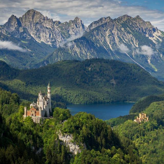 Neuschwanstein Castle and Hohenschwangau Castle with a view of the mountain scenery